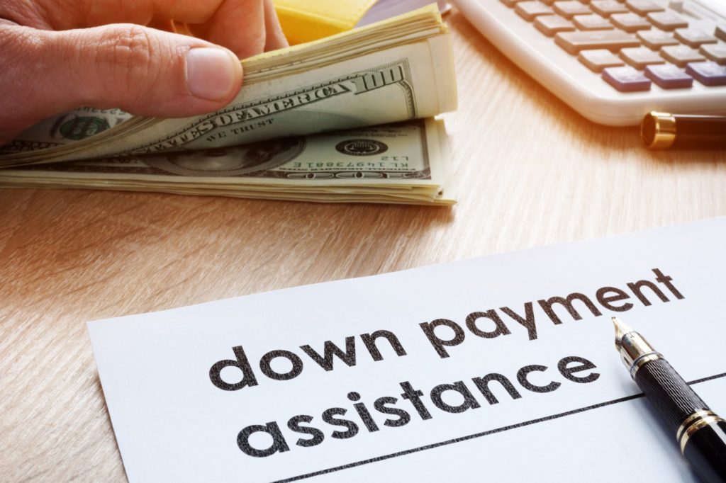 Dollar, Pen and Down Payment assistance tag
