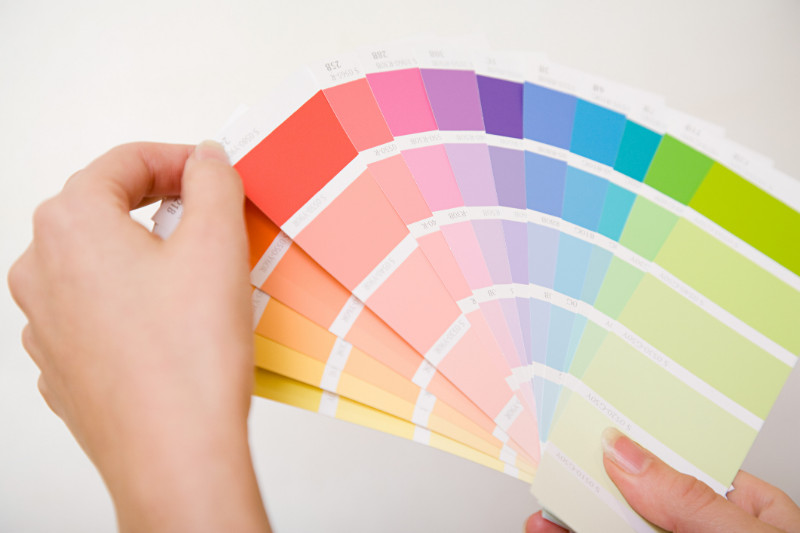 A color chart being held